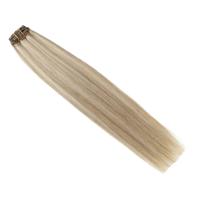 Clip-in hair extensions, Remy human hair, light brown to light blonde blend, long and voluminous, easy to attach, reusable, straight, wavy, natural-looking, seamless, salon-quality, hair length extensions, temporary hair lengthening, thickening, hair styling, DIY hairstyle, premium hair extensions, lightweight and comfortable.